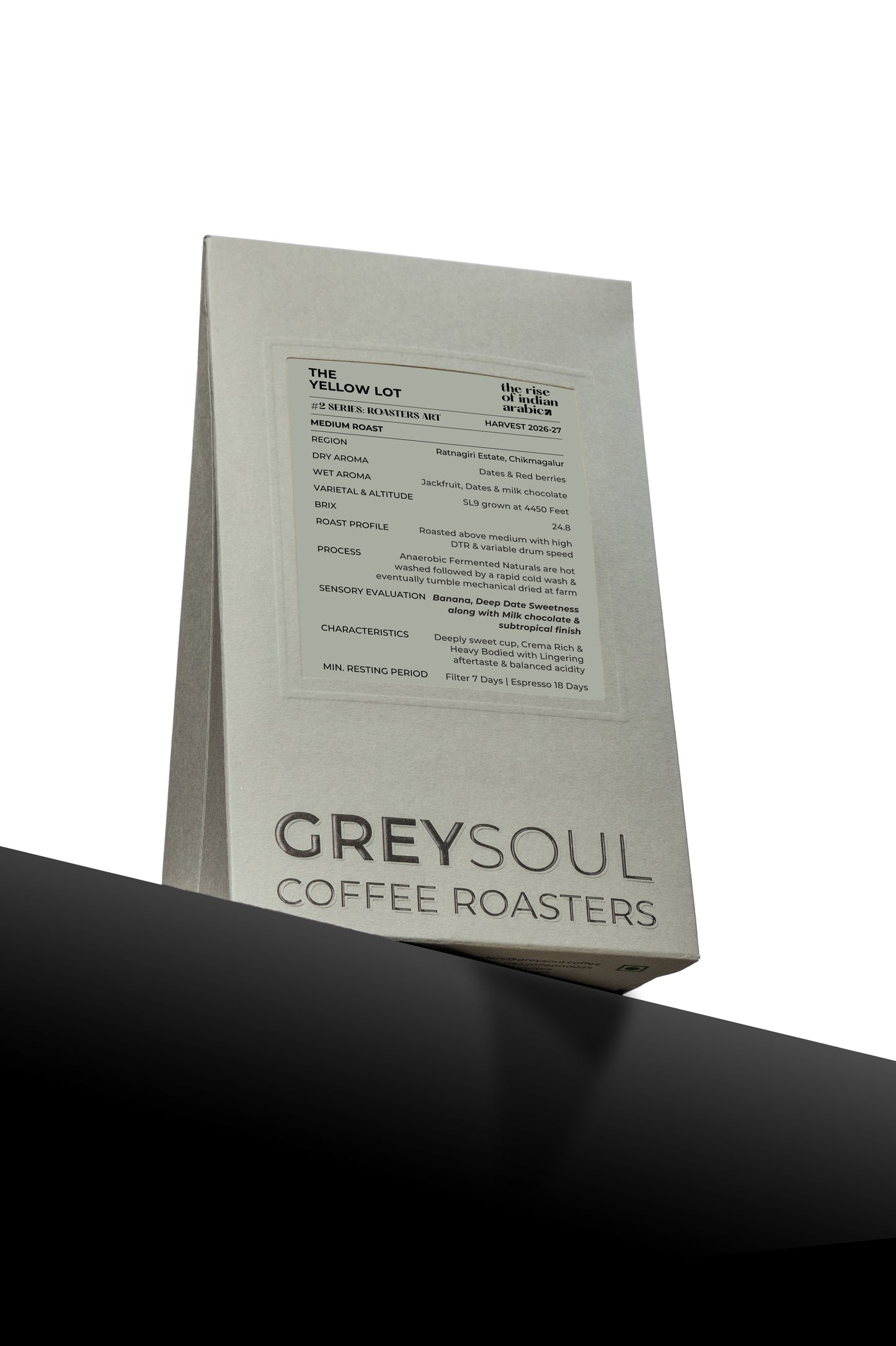 Coffee bag from Greysoul Coffee Roasters on a black surface with a white background